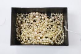 Various cultured pearls necklaces, lacking clasps and some loose pearls.