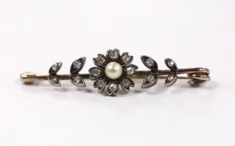 A late Victorian yellow and white metal, seed pearl and diamond cluster set flower head bar