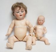 A Schutzmeister & Quendt bisque character doll, German, circa 1920 impressed 201, entwined SQ 6,
