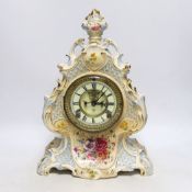 A Royal Bonn pottery mantel clock with Ansonia movement, striking on a coiled gong, 37cm high