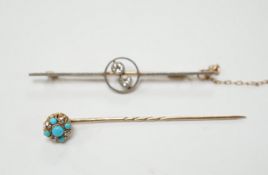 An early 20th century yellow metal, white metal and two stone diamond crossover set bar brooch, 57mm