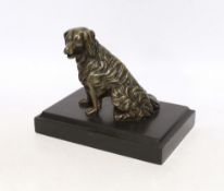 A 19th century French bronze dog card holder with articulated jaw, raised on a slate base, 18cm