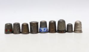 Seven assorted early 20th century and later silver thimbles, including two enamelled and a Dutch?