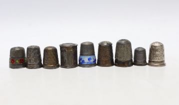 Seven assorted early 20th century and later silver thimbles, including two enamelled and a Dutch?