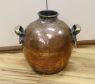 A large 19th century Egyptian copper olive jar with twin handles, 42cm high