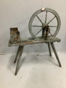 A 19th century painted wool winder, height 105cm