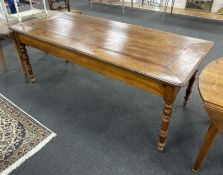 A 19th century French rectangular cherry kitchen table with slide and drawer, width 198cm, depth