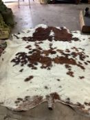 A cow hide rug