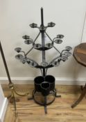 A wrought iron candlestand, height 107cm