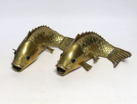 A pair of Chinese polished brass models of carp, 20cm