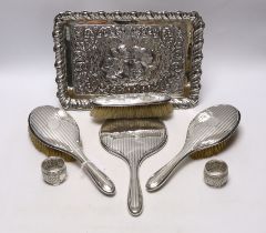 An Edwardian repousse silver dressing table tray, with Reynold's Angels decoration, Birmingham,