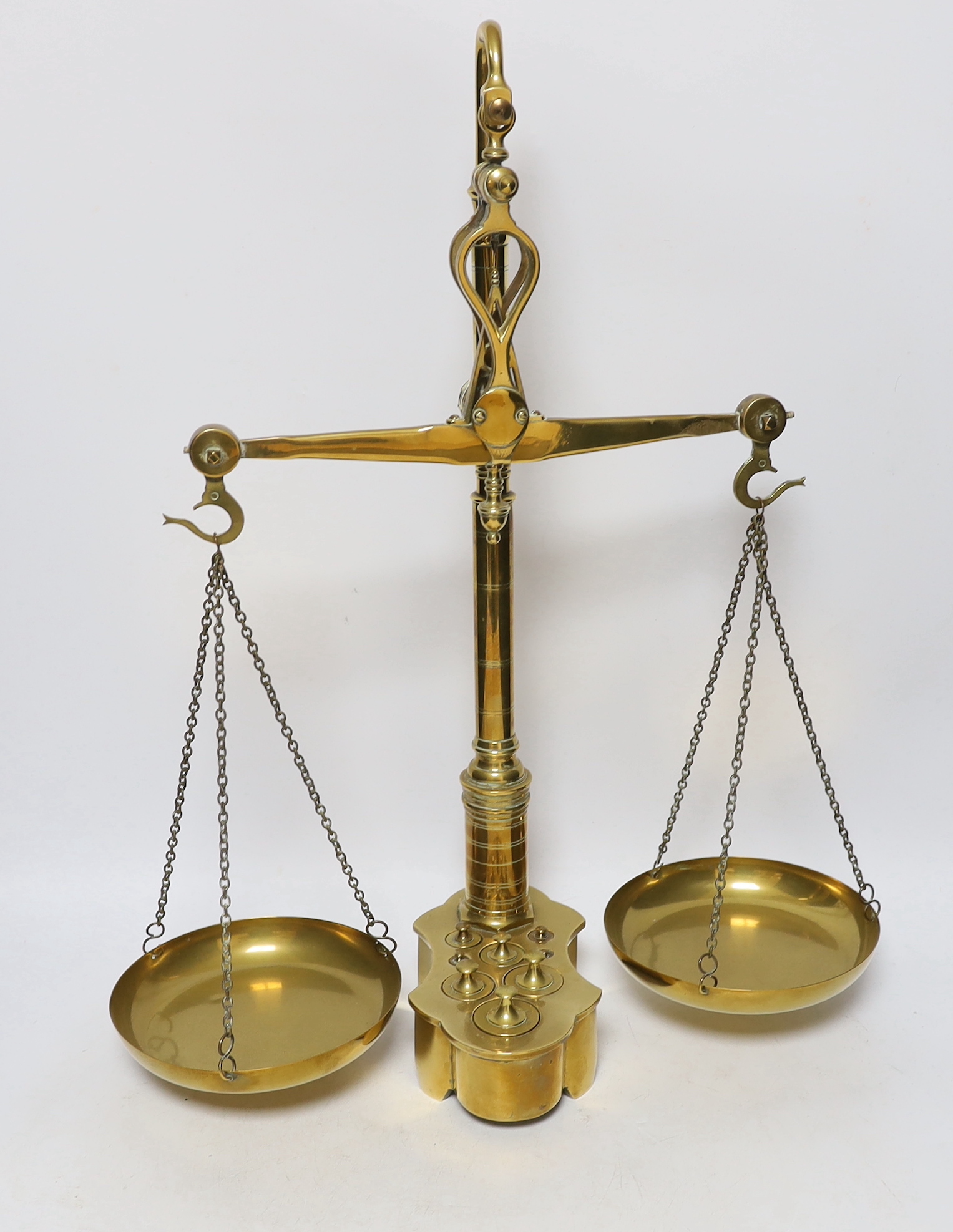 A set of brass kg scales, and integral weights, 55cm high