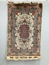 A North West Persian ivory ground part silk rug, 160 x 100cm