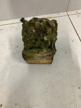 A cast stone gargoyle, width 19cm, height 16cm