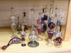 A collection of gilded glass scent bottles and stoppers, 27cm