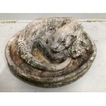 A circular stone otter fountain head, diameter 42cm