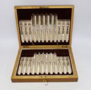 An Edwardian cased set of mother of pearl handled plated dessert knives and forks with silver