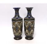 A pair of Doulton Lambeth stoneware vases, decorated by Elizabeth Fisher, stamped and incised to the