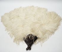 A 1930's boxed French cream Ostrich feather fan with tortoiseshell guards