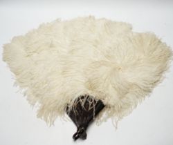 A 1930's boxed French cream Ostrich feather fan with tortoiseshell guards