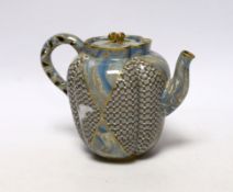 A good Doulton & Rix's patent Marqueterie ware teapot, c.1887, of quatrelobed form with 'teardrop'