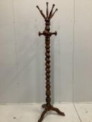 A Victorian style turned beech coat stand, height 200cm