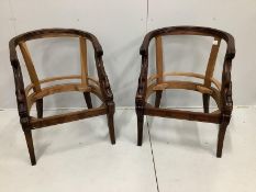 A pair of Empire style mahogany Bergere chair frames, width 67cm, depth 60cm, height 84cm