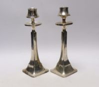 A pair of George V silver candlesticks, of tapering form, Charles S. Green & Co, Birmingham, 1924/