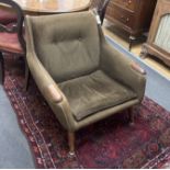 In the manner of Hans Wegner, a Danish style upholstered lounge chair, width 74cm, depth 68cm,