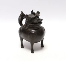 A Chinese bronze mythical beast censer and cover (Luduan), 17th century, the cover with pierced