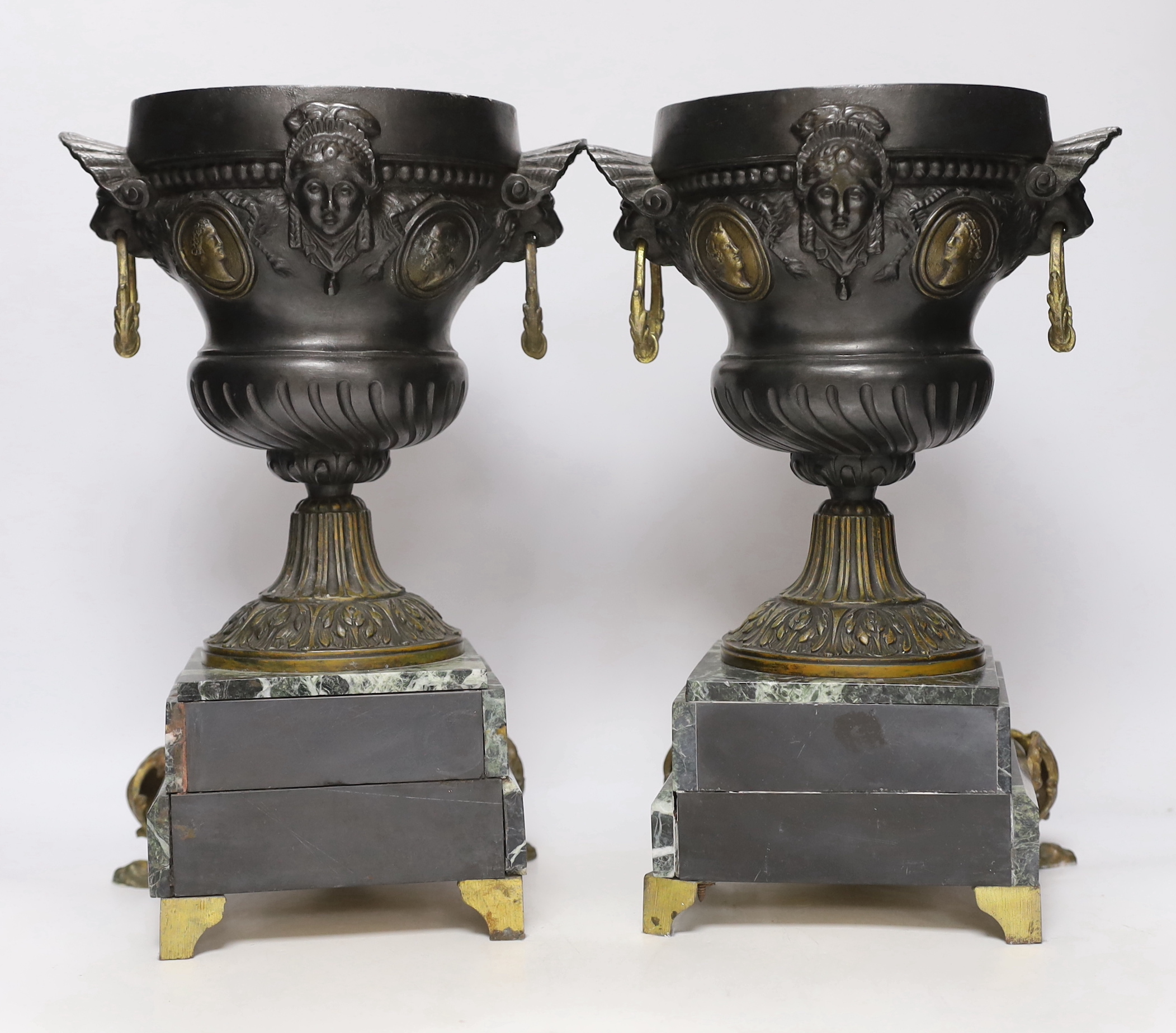 A pair of late 19th century French gilt metal and brown patinated urns, decorated with masks and - Image 3 of 3