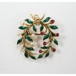 A yellow metal, green enamel, ruby and seed pearl cluster set wreath pendant brooch, 29mm, gross
