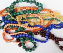 A quantity of assorted jewellery including costume, necklaces including amber, malachite, lapis