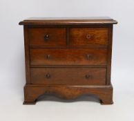 A Victorian miniature mahogany chest of drawers, 26cm high x 28cm wide