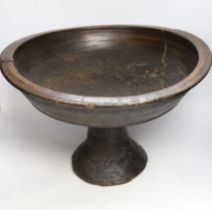 A 19th century turned wooden, possibly French, provincial pedestal bowl