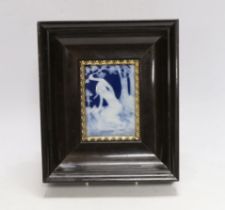 A Limoges pate sur pate plaque of a maiden in a wooded landscape by Marcel Chaufriasse, framed,