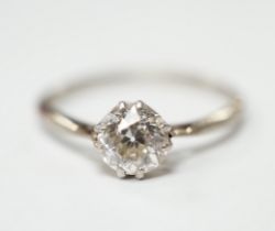 A white metal and solitaire diamond set ring, size O/P, gross weight 2.4 grams, the stone weighing