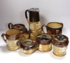 Seven items of mixed Doulton stoneware including a silver mounted tyg, largest 27cm high