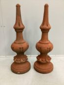 A pair of cast stone roof finials, height 72cm