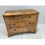 An early 19th century pine chest of four drawers, width 104cm, depth 52cm, height 82cm