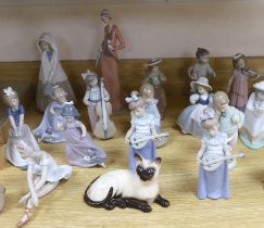 Seventeen Nao models, a Lladro ballerina and a Beswick cat (19)