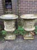 A pair of reconstituted stone campana garden urns, diameter 62cm, height 89cm