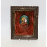 A Limoges oval enamelled plaque of a medieval girl, signed to the reverse, E. Blanchez, framed,