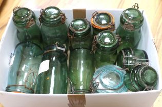 A collection of various sized French green glass storage jars (12),