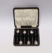 A cased set of six George V silver bean end coffee spoons, Sheffield, 1929.