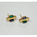 A modern pair of 18t gold, two emerald and sapphire set ear studs, 12mm by 7mm, gross weight 3.3