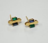 A modern pair of 18t gold, two emerald and sapphire set ear studs, 12mm by 7mm, gross weight 3.3