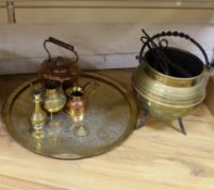 A brass cauldron shaped coal scuttle, a large circular tray, two kettles, a jug and a vase, tray