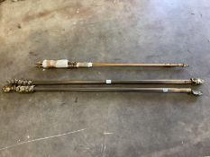 Two pairs of gilt metal curtain poles together with assorted brackets, rings and fixings, larger