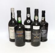 Five bottles of assorted Port including 1982 Taylors and 1979 Grahams